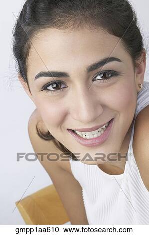 Close up of Hispanic teenage girl View Large Photo Image Stock Image - Close up of Hispanic teenage girl. Fotosearch