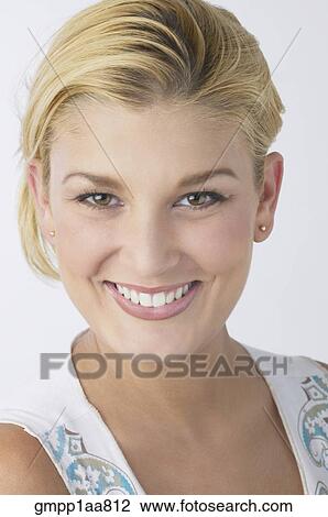 Stock Image - Close up of Hispanic woman smiling. Fotosearch