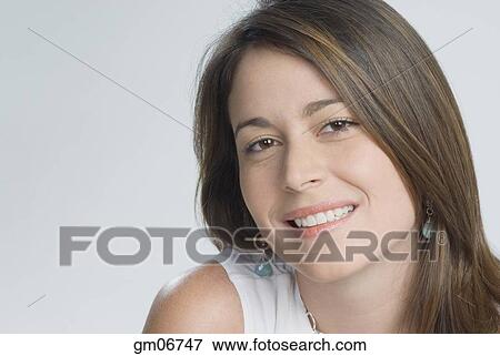 Close up of Hispanic woman smiling View Large Photo Image Stock Photo - Close up of Hispanic woman smiling. Fotosearch