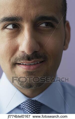 Stock Photo - Close up of Middle Eastern businessman. Fotosearch