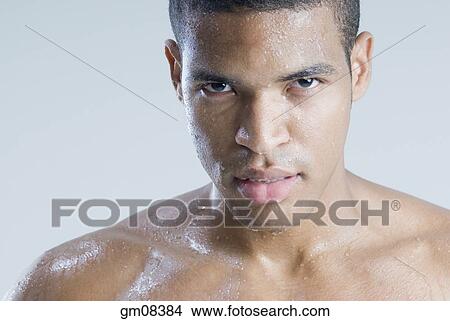 Close up of wet African man View Large Photo Image Picture - Close up of wet African man . Fotosearch