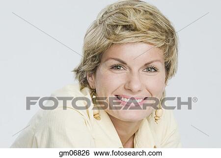 Close up of woman smiling View Large Photo Image Stock Photograph - Close up of woman smiling. Fotosearch