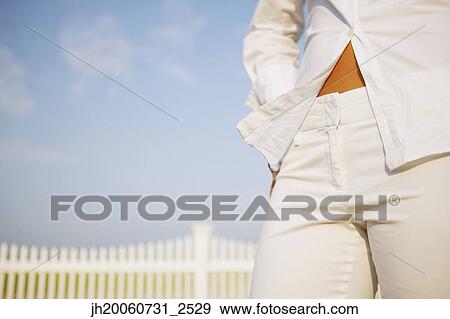 Close up of woman’s midsection View Large Photo Image Stock Photo - Close up of woman’s midsection. Fotosearch