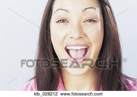 Close up of young woman laughing View Large Photo Image Stock Image - Close up of young woman laughing. Fotosearch