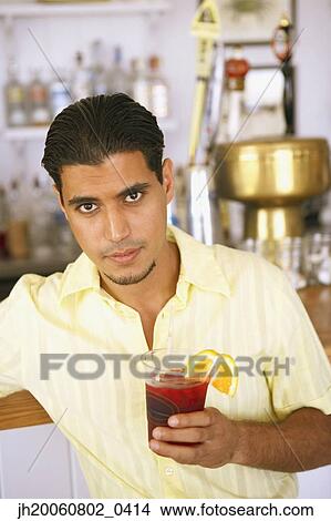 Egyptian man drinking at bar View Large Photo Image Picture - Egyptian man drinking at bar. Fotosearch