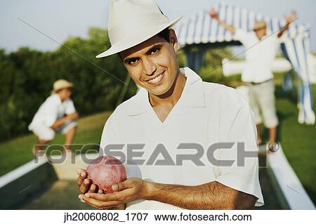 Egyptian man holding ball View Large Photo Image Stock Photo - Egyptian man holding ball. Fotosearch