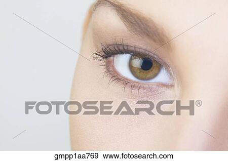 Stock Photo - Extreme close up of Hispanic woman’s eye. Fotosearch