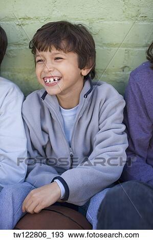 Hispanic boy holding basketball View Large Photo Image Stock Image - Hispanic boy holding basketball. Fotosearch