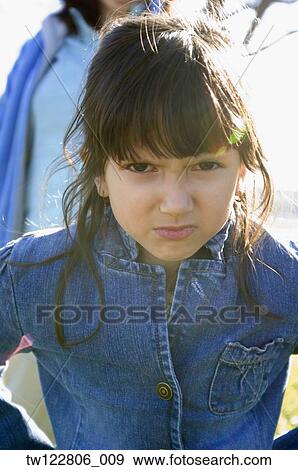 Hispanic girl looking angry View Large Photo Image Stock Photo - Hispanic girl looking angry. Fotosearch