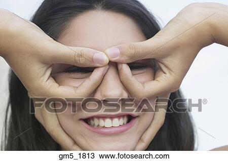 Hispanic girl making a face View Large Photo Image Stock Image - Hispanic girl making a face. Fotosearch
