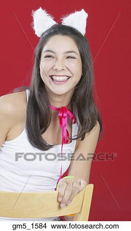 Hispanic girl wearing rabbit ears View Large Photo Image Picture - Hispanic girl wearing rabbit ears. Fotosearch