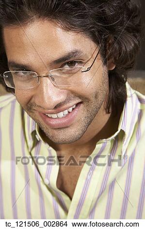 Hispanic man wearing eyeglasses View Large Photo Image Picture - Hispanic man wearing eyeglasses. Fotosearch