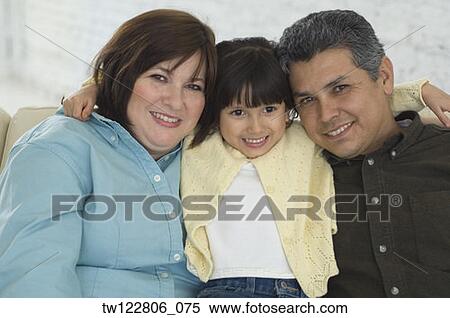 Hispanic parents and daughter hugging View Large Photo Image Stock Photography - Hispanic parents and daughter hugging. Fotosearch