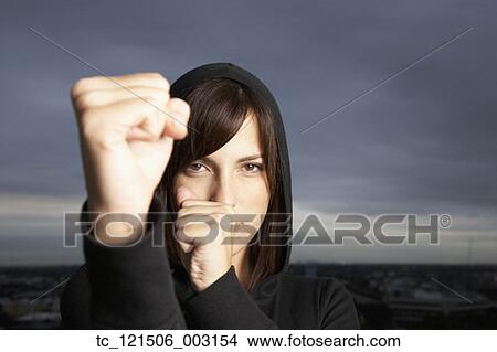Hispanic woman in fighting stance View Large Photo Image Picture - Hispanic woman in fighting stance. Fotosearch