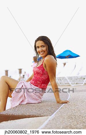 Hispanic woman wearing bathing suit View Large Photo Image Stock Photograph - Hispanic woman wearing bathing suit. Fotosearch