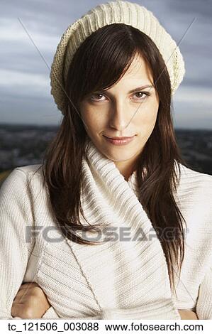 Hispanic woman wearing hat and sweater View Large Photo Image Stock Photo - Hispanic woman wearing hat and sweater. Fotosearch