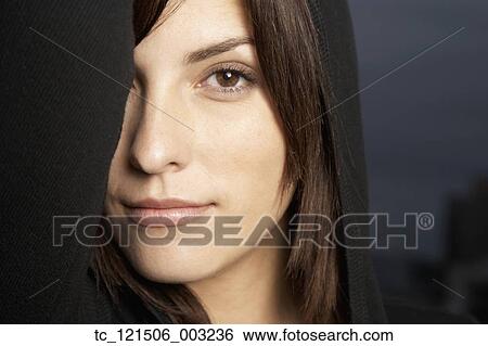 Hispanic woman with arm over eye View Large Photo Image Stock Photograph - Hispanic woman with arm over eye. Fotosearch