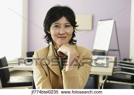 Kazakh businesswoman in conference room View Large Photo Image Stock Photography - Kazakh businesswoman in conference room. Fotosearch