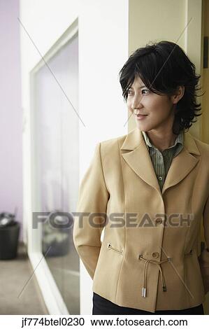 Kazakh woman standing in doorway View Large Photo Image Stock Image - Kazakh woman standing in doorway. Fotosearch
