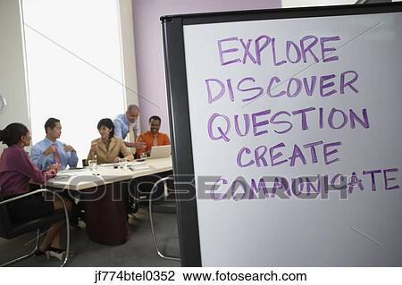 Multi-ethnic businesspeople having meeting View Large Photo Image Stock Image - Multi-ethnic businesspeople having meeting. Fotosearch