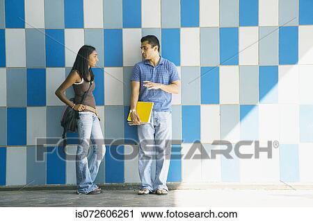 Multi-ethnic college students talking View Large Photo Image Stock Image - Multi-ethnic college students talking. Fotosearch