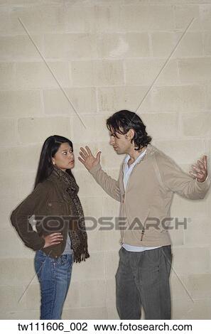 Stock Image - Multi-ethnic couple arguing. Fotosearch