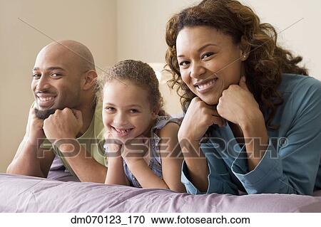 Portrait of African family indoors View Large Photo Image Stock Image - Portrait of African family indoors. Fotosearch