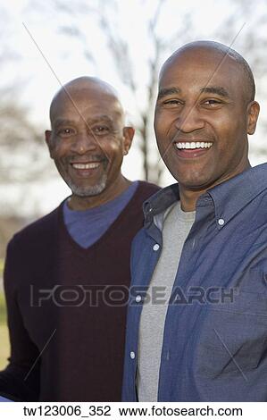 Portrait of African father and adult son View Large Photo Image Stock Image - Portrait of African father and adult son. Fotosearch