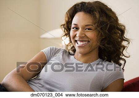 Portrait of African woman indoors View Large Photo Image Picture - Portrait of African woman indoors. Fotosearch
