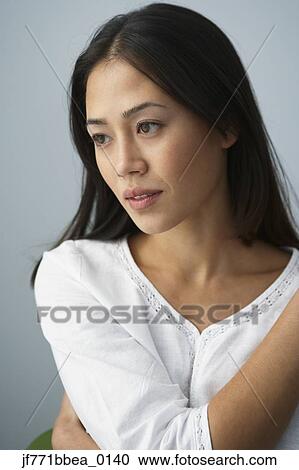 Stock Image - Portrait of Asian woman. Fotosearch