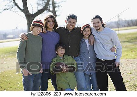 Portrait of Hispanic family at park View Large Photo Image Stock Image - Portrait of Hispanic family at park. Fotosearch