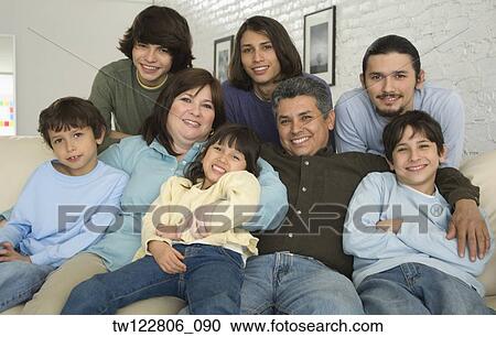Portrait of Hispanic family on sofa View Large Photo Image Stock Image - Portrait of Hispanic family on sofa. Fotosearch