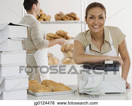 Portrait of Hispanic female bakery worker View Large Photo Image Stock Photo - Portrait of Hispanic female bakery worker. Fotosearch