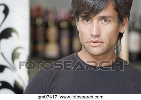 Stock Photo - Portrait of Hispanic man . Fotosearch