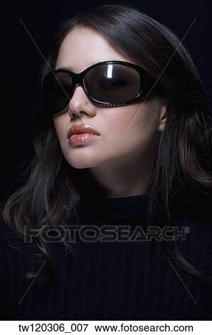 Portrait of Hispanic woman wearing sunglasses View Large Photo Image Stock Photo - Portrait of Hispanic woman wearing sunglasses. Fotosearch