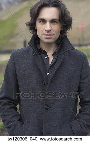 Portrait of man with hands in jacket pockets View Large Photo Image Stock Image - Portrait of man with hands in jacket pockets. Fotosearch