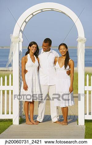 Three friends in archway at beach View Large Photo Image Stock Image - Three friends in archway at beach. Fotosearch