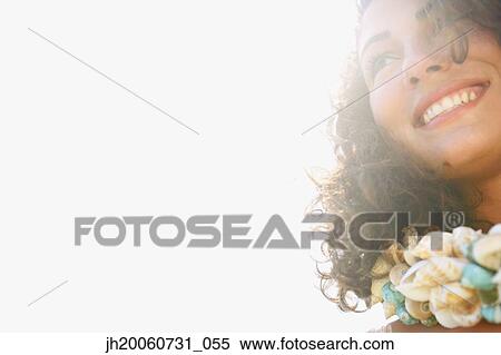 Woman wearing seashell necklace View Large Photo Image Stock Photography - Woman wearing seashell necklace. Fotosearch