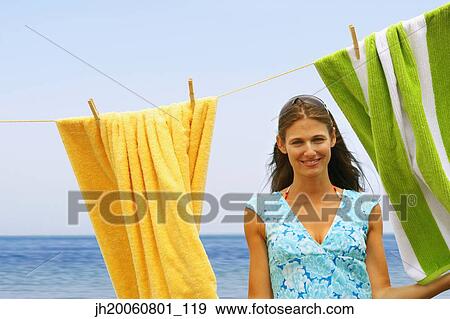 Young woman at beach View Large Photo Image Stock Photo - Young woman at beach. Fotosearch