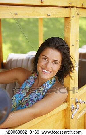 Young woman driving old fashioned car View Large Photo Image Stock Photo - Young woman driving old fashioned car. Fotosearch