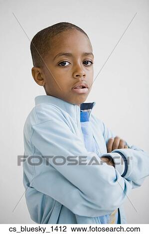 African boy with arms crossed View Large Photo Image Stock Image - African boy with arms crossed. Fotosearch