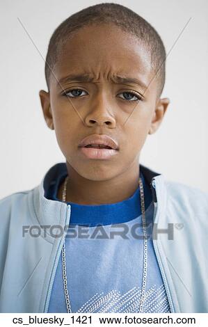 African boy with furrowed brow View Large Photo Image Stock Image - African boy with furrowed brow. Fotosearch