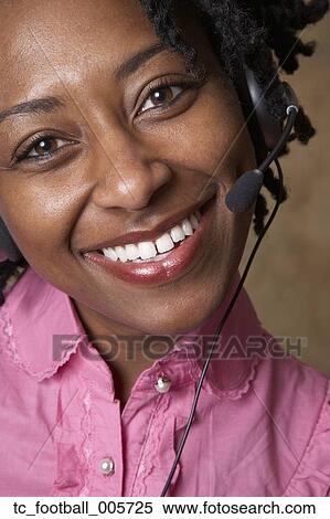 African businesswoman wearing headset View Large Photo Image Stock Photography - African businesswoman wearing headset. Fotosearch