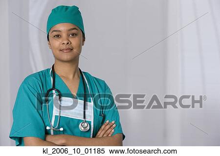 African female doctor with arms crossed View Large Photo Image Stock Photography - African female doctor with arms crossed. Fotosearch