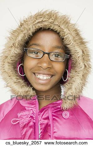 Stock Photo - African girl wearing fur trimmed hood. Fotosearch