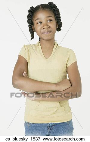 African girl with arms crossed View Large Photo Image Stock Photo - African girl with arms crossed. Fotosearch