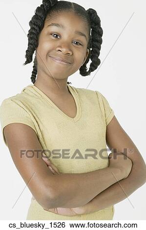 African girl with arms crossed View Large Photo Image Stock Photograph - African girl with arms crossed. Fotosearch
