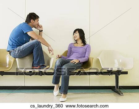 Asian couple smiling at each other View Large Photo Image Stock Image - Asian couple smiling at each other. Fotosearch