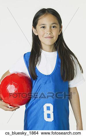 Asian girl holding soccer ball View Large Photo Image Picture - Asian girl holding soccer ball. Fotosearch