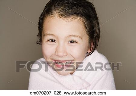 Stock Photo - Asian girl wrapped in towel. Fotosearch
